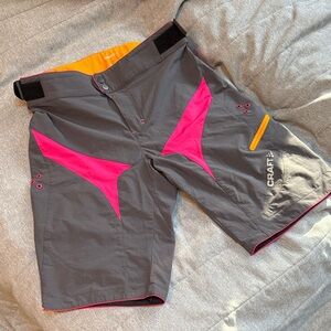 Craft Women's Mountain Bike Shorts in Gray and Pink